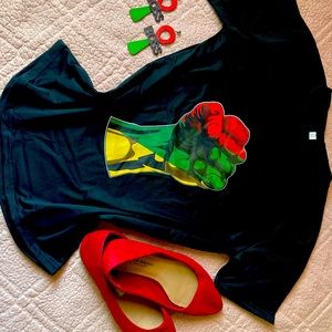 Black t shirt with a fist of what? Use your imagination.😎